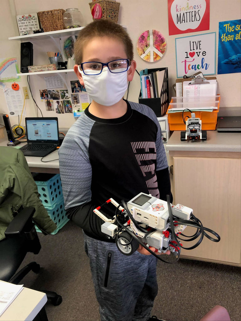 Student with Robot