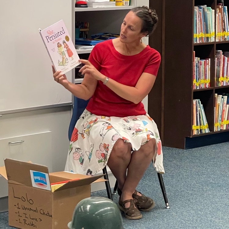 Amanda Curtis reads “She Persisted” to fourth graders