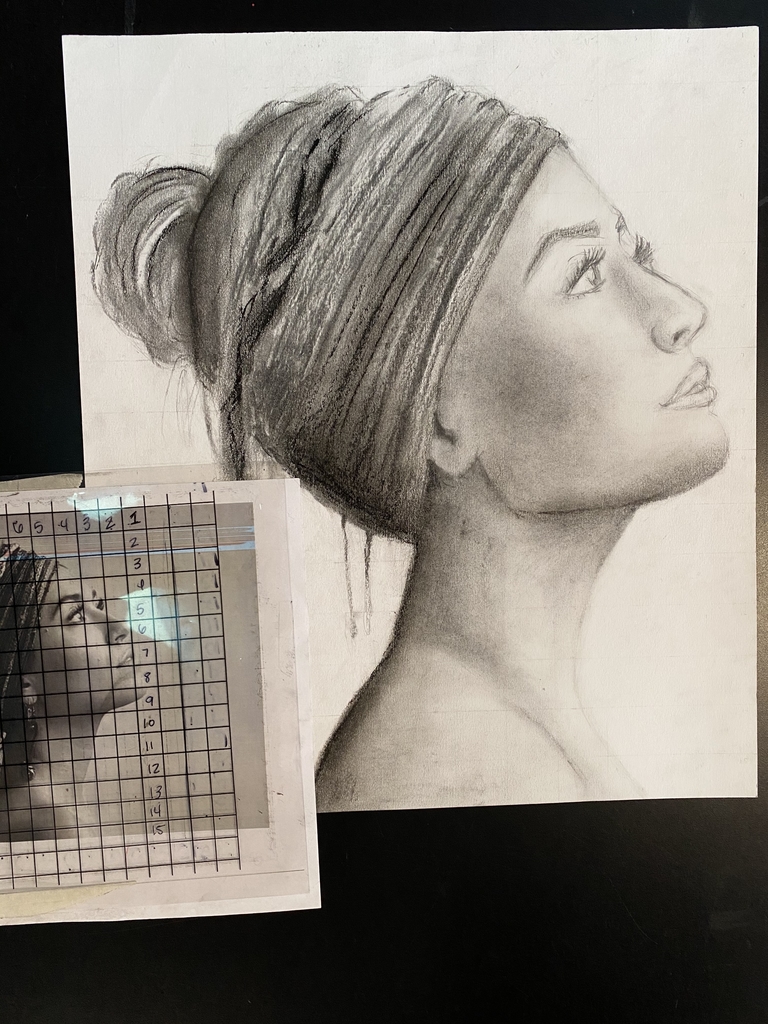 7th grade Lily, using a grid to enlarge an image.